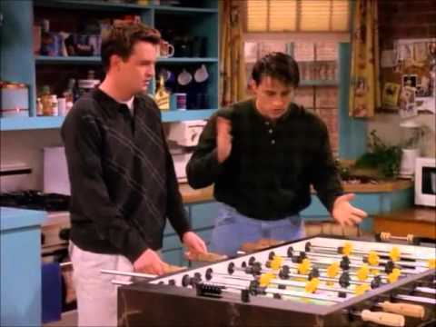 two men playing table football